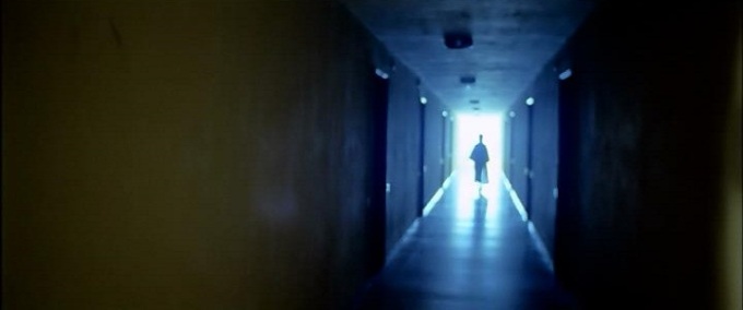 Silhouette in a dark corridor (image from the film)